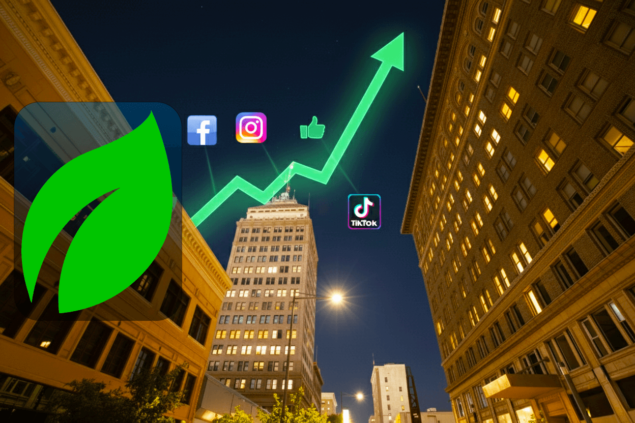 Social media management by Advine in downtown Fresno, California, with a green growth arrow and social media icons over the Pacific Southwest Building at night.