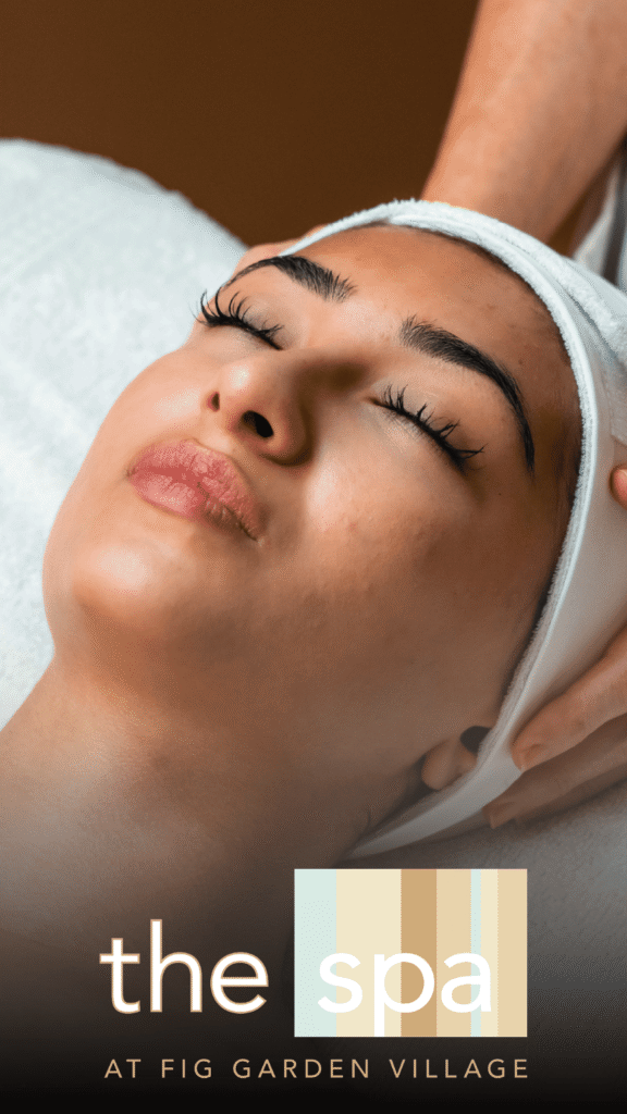 The Spa Advine's focused beauty photography features a close-up of a woman receiving a luxurious facial or head massage at The Spa at Fig Garden Village, conveying a sense of relaxation and high-end service.