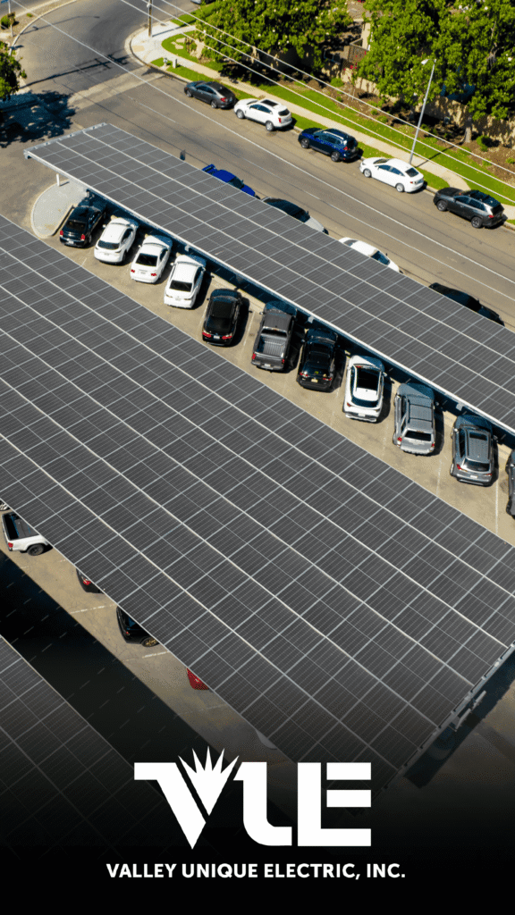 Valley Unique Electric Advine's aerial photography provides a striking overhead view of a large parking lot covered by newly installed solar carports, showcasing the clean energy and large-scale commercial work of Valley Unique Electric, Inc. (VUE).